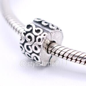 Authentic PANDORA Retired Sterling Silver Swirls Clip